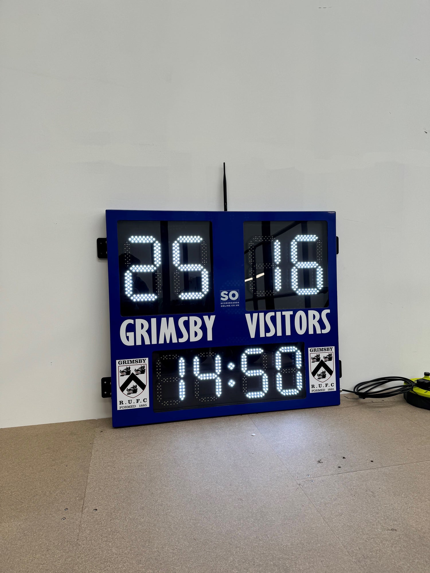 an electronic rugby scoreboard personalised to Grimsby RUFC. It includes LED digits for the Home scores, Away scores and the timer/clock module.