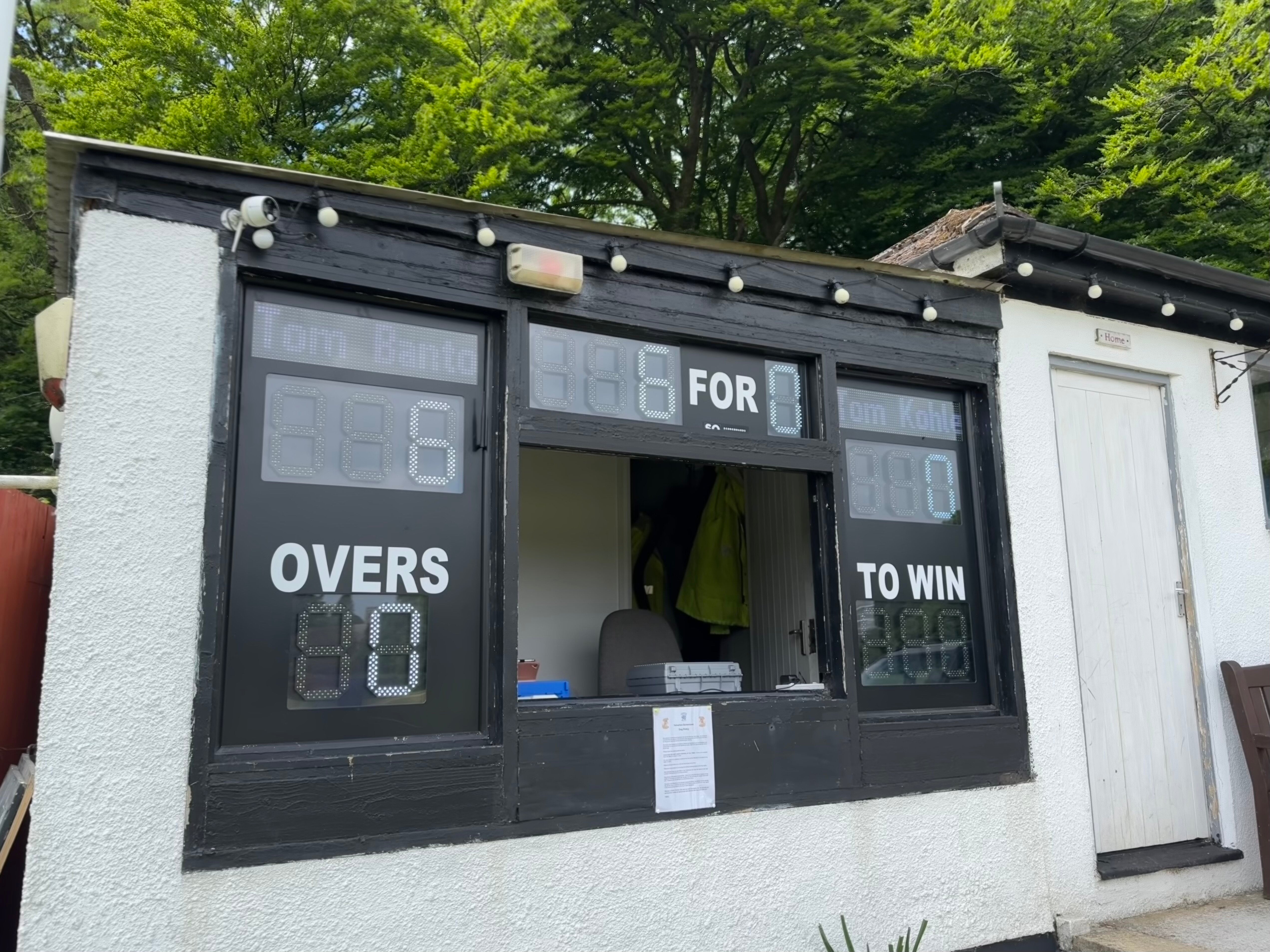 custom DIY electronic scoreboard for Yelverton CC. The bright LEDs display the batter names, total, batter scores, overs and a to win.